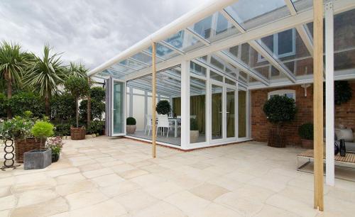 Garden room veranda in white uPVC with bifolding doors StratDSC 9423